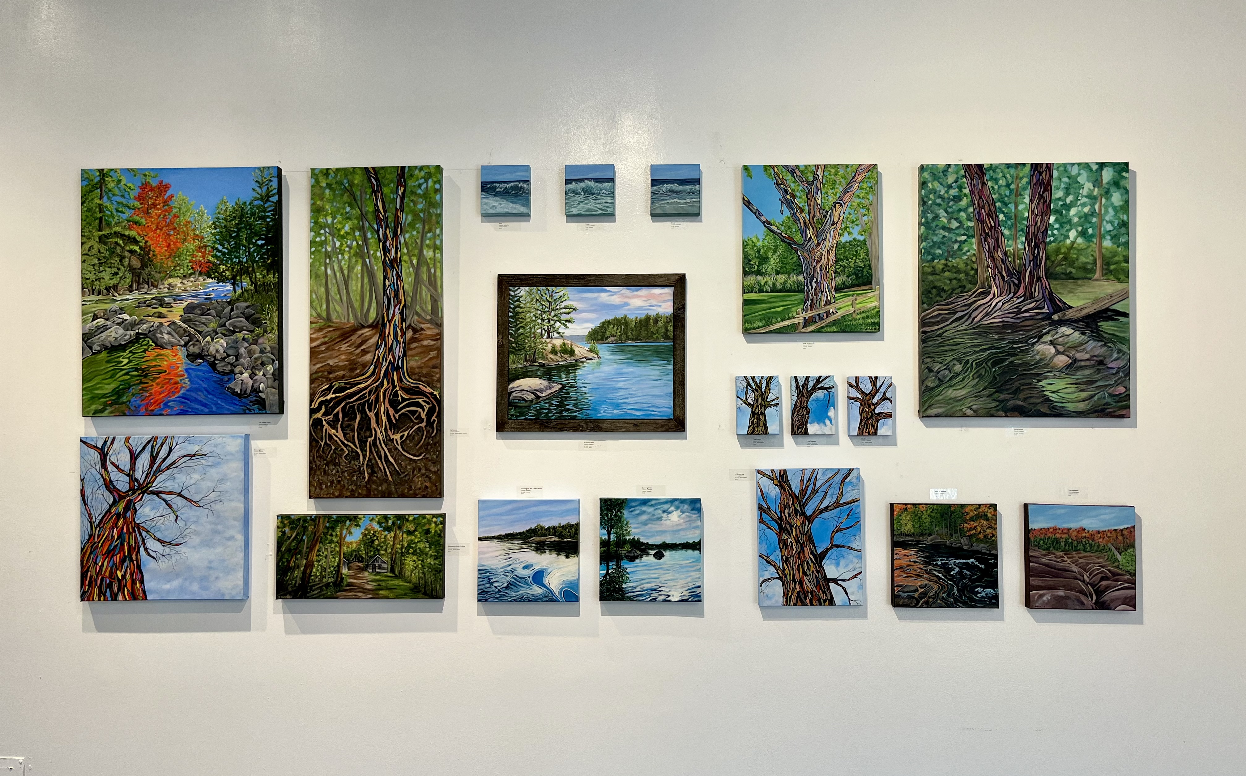 Twist — Gallery wall with colorful landscape paintings